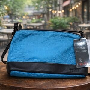 TUMI Blue and Black Toiletry Bag